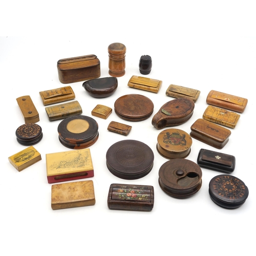 558 - A collection of treen snuff boxes, to include a lignum vitae example, another constructed from 