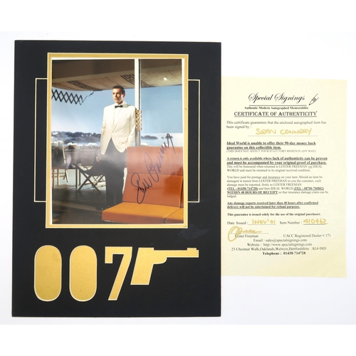 561 - Sean Connery: a signed James Bond movie still photograph, with accompanying certificate of authentic... 