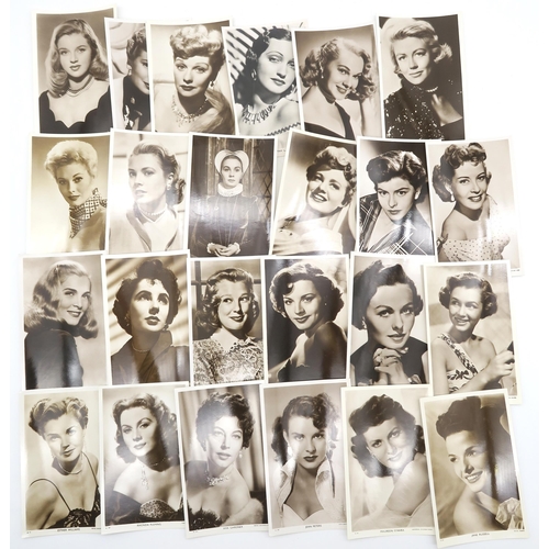 562 - A large collection of vintage Golden Age of Hollywood movie star photographic postcards and related ... 