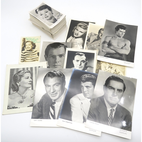 562 - A large collection of vintage Golden Age of Hollywood movie star photographic postcards and related ... 