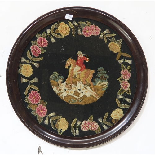 566 - A circular framed foxhunting tapestry, a George VI needlework sampler and an assortment of framed pr... 