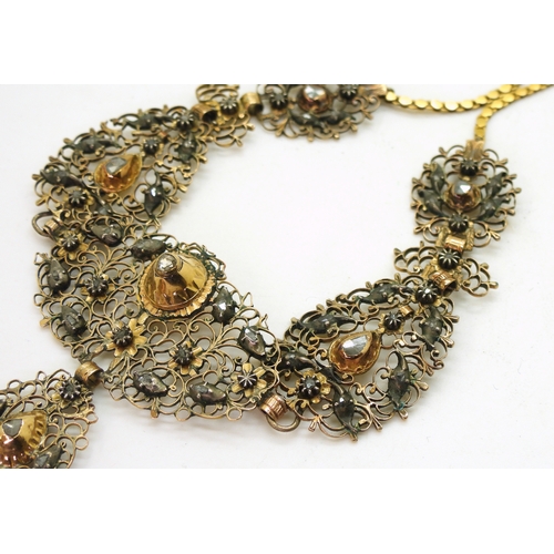 2709 - AN ANTIQUE SPANISH DIAMOND NECKLACEset with rose cut diamonds to the scroll filligree panels made in... 