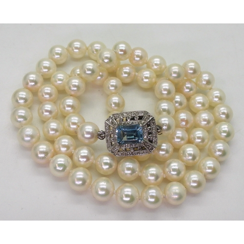 2711 - PEARLS WITH A DECORATIVE CLASPa string of good quality pearls each approx 6.3mm, overall length 48cm... 