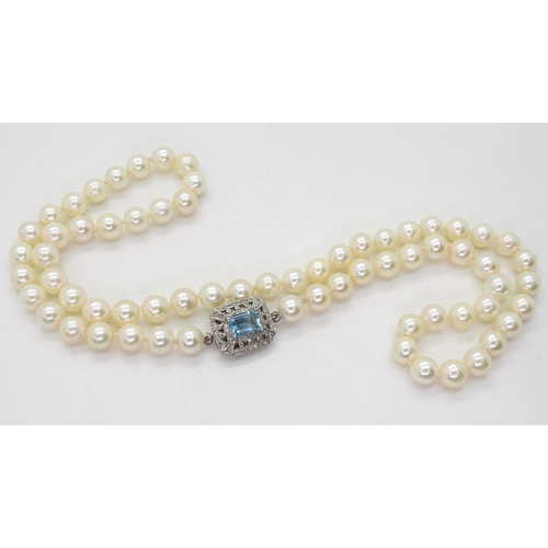 2711 - PEARLS WITH A DECORATIVE CLASPa string of good quality pearls each approx 6.3mm, overall length 48cm... 