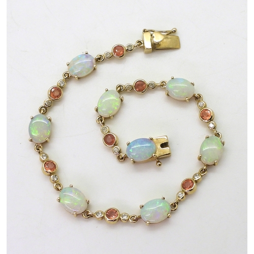 2715 - A 9CT GOLD BRACELETset with oval opals and pink and white sapphires, length 19cm, with a heart detai... 