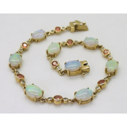 2715 - A 9CT GOLD BRACELETset with oval opals and pink and white sapphires, length 19cm, with a heart detai... 