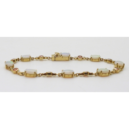 2715 - A 9CT GOLD BRACELETset with oval opals and pink and white sapphires, length 19cm, with a heart detai... 