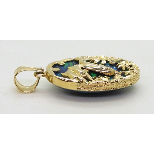 2722 - A 14K DOLPHIN PENDANTset with a large piece of man made opal of approx 2.4cm x 1.8cm, length of pend... 