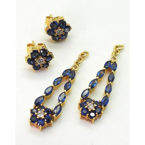 2727 - SAPPHIRE & DIAMOND FLOWER EARRINGSmade in  bright yellow metal and set with marquis and round cu... 