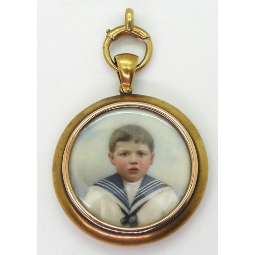 2729 - *WITHDRAWN* A DOUBLE SIDED LOCKETwith glazed portrait miniatures of children, a little lad in a sail... 