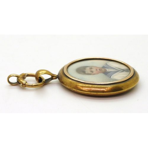 2729 - *WITHDRAWN* A DOUBLE SIDED LOCKETwith glazed portrait miniatures of children, a little lad in a sail... 