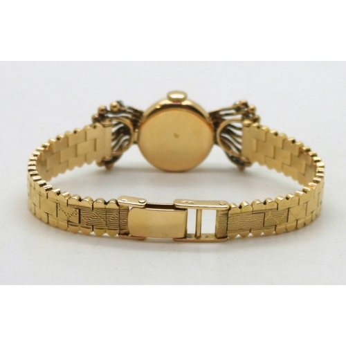 2902 - A FRENCH COCKTAIL WATCHthe ladies Silvane watch is made in 18ct gold and set with ten eight cut diam... 