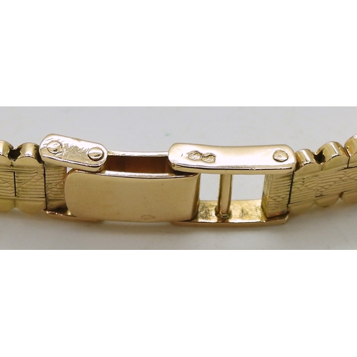 2902 - A FRENCH COCKTAIL WATCHthe ladies Silvane watch is made in 18ct gold and set with ten eight cut diam... 