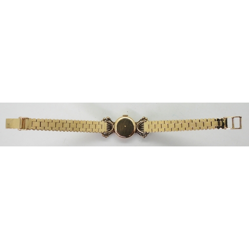 2902 - A FRENCH COCKTAIL WATCHthe ladies Silvane watch is made in 18ct gold and set with ten eight cut diam... 