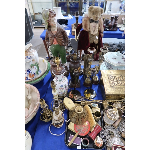 304 - A brass slipper box with Louis Wain style decoration, assorted other brass, photograph frames, ... 