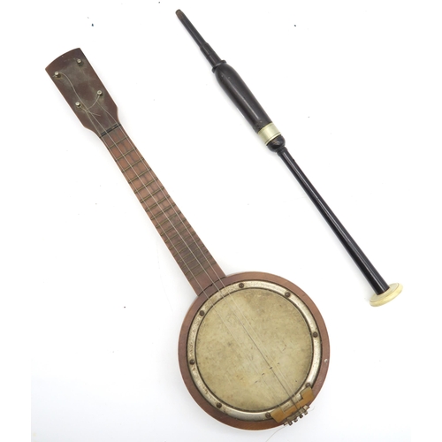 574 - A mandolin-banjo and a bagpipe chanter with imitation ivory sole (2)