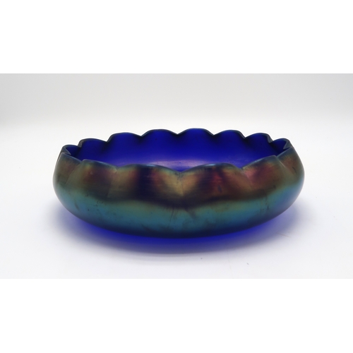 2178 - AN IRIDESCENT GLASS FRUIT BOWLwith scalloped rim, possibly WMF, 27cm diameter, together with a Frenc... 