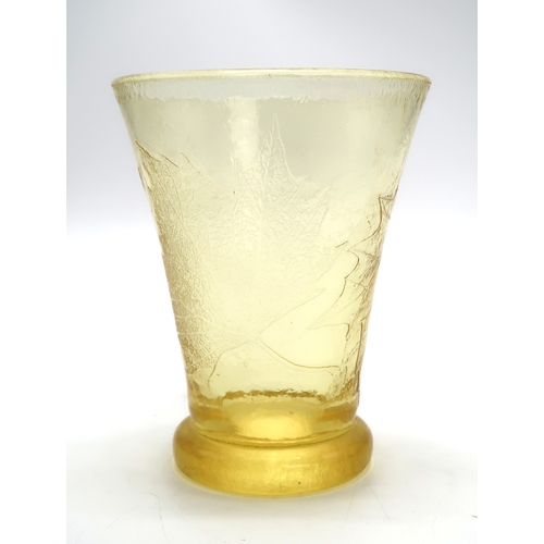 2179 - A DAUM NANCY VASEof clear yellow glass with acid etched leaves, moulded mark to side, 19cm high... 