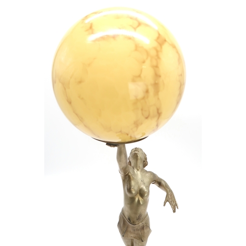 2183 - AN ART DECO GILDED SPELTER LADY LAMPmodelled standing on tiptoes, holding the glass ball shade aloft... 