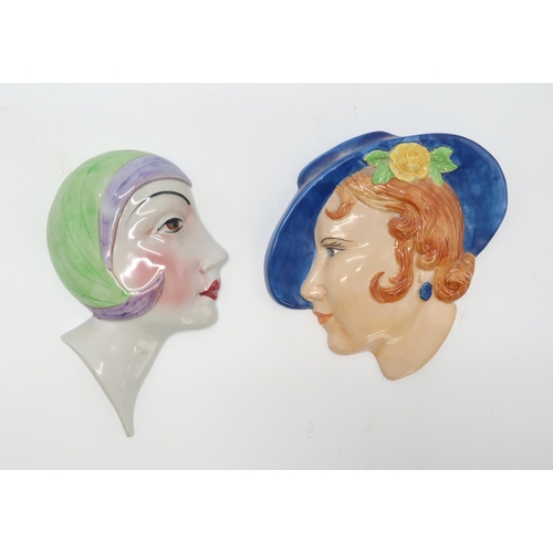 2186 - A COLLECTION OF ART DECO POTTERY WALL MASKSeach modelled as a woman's head, many by C Ltd including ... 