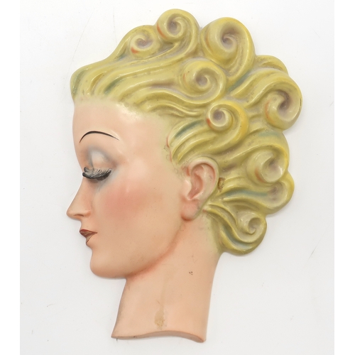 2187 - A GOEBEL WALL MASK BY AGNES RICHARDSONmodelled as a girls head with curly blonde hair, no R24, 21.5c... 