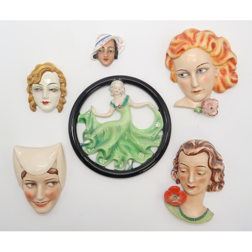 2188 - SIX GOEBEL POTTERY WALL MASKSincluding a circular example with a girl in green dress dancing, FX111,... 