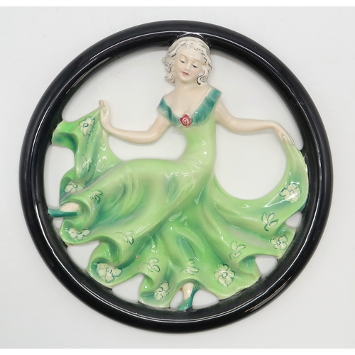 2188 - SIX GOEBEL POTTERY WALL MASKSincluding a circular example with a girl in green dress dancing, FX111,... 