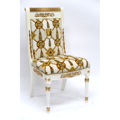 2085 - A CONTEMPORARY VERSACE DINING SUITE consisting of gilt white dining table on twin fluted square pede... 