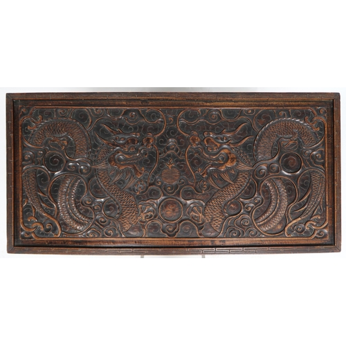 2008 - A CHINESE CAMPHORWOOD BLANKET CHEST  Extensively carved with dragons and clouds, a hinged lid, carve... 