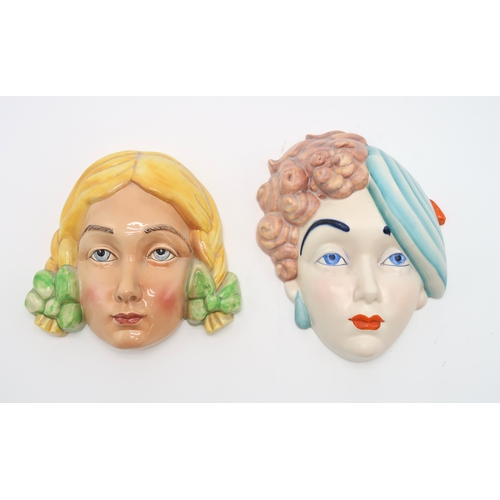 2184 - A BESWICK POTTERY 1930S ART DECO FACE MASKmodelled as a girl with curly brown hair,  green beret and... 
