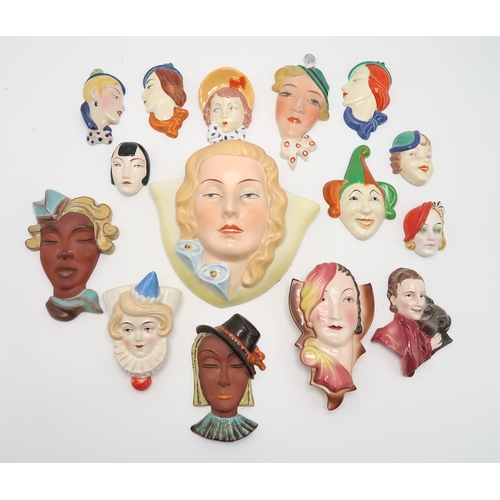 2189 - A COLLECTION OF CZECHOSLOVAKIAN ART DECO WALL MASKSmodelled as female heads with painted decoration,... 