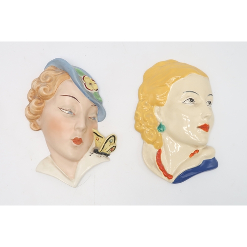 2191 - A COLLECTION OF CZECHOSLOVAKIAN ART DECO WALL MASKSall of girls' heads, including a Royal Dux exampl... 