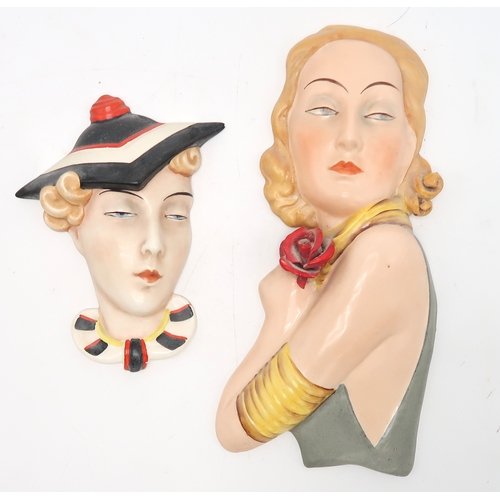 2192 - A COLLECTION OF CZECHOSLOVAKIAN ART DECO WALL MASKSall of girls' heads, including a Royal Dux exampl... 