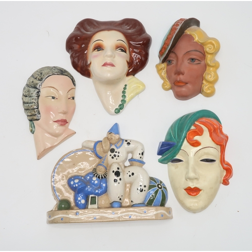 2195 - A COLLECTION OF CZECHOSLOVAKIAN ART DECO WALL MASKSall of girls' heads, some with incised and printe... 