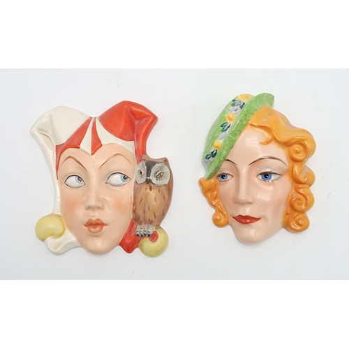 2197 - A CZECHOSLOVAKIAN ART DECO WALL MASKmodelled as a jester with an owl perched on her shoulder, impres... 