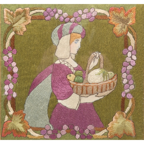 2198 - AN ARTS AND CRAFTS EMBROIDERED FRAMED PANELsewn in silks depicting a woman in medieval dress carryin... 