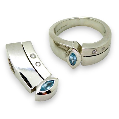 2721 - TOPAZ & DIAMOND SUITEcomprising of a 18ct white gold ring, set with a blue topaz and diamond acc... 