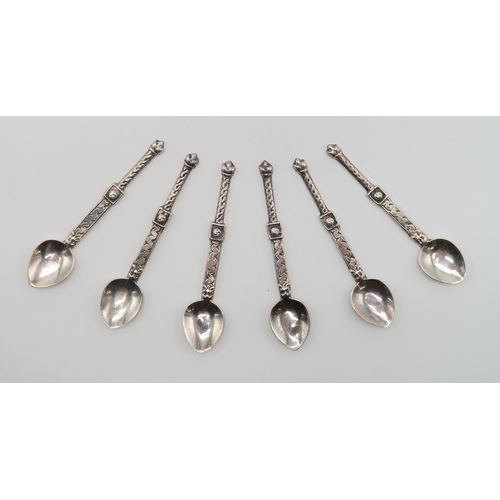 2466 - ALEXANDER RITCHIE; A cased set of six Iona silver 'nunnery' spoons, of medieval celtic style design,... 