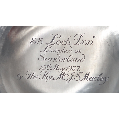 2470 - NAVAL INTEREST; A George VI silver armada dish, by Reid & Sons, London 1936, inscribed to the ba... 