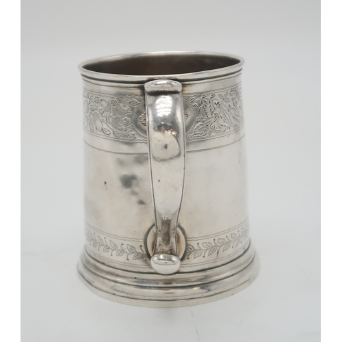 2478 - A QUEEN ANNE BRITANNIA STANDARD SILVER MUGLondon 1713, maker's mark rubbed, of tapering cylindrical ... 