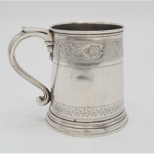 2478 - A QUEEN ANNE BRITANNIA STANDARD SILVER MUGLondon 1713, maker's mark rubbed, of tapering cylindrical ... 