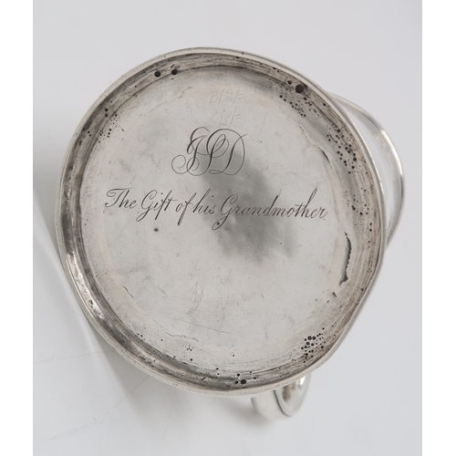 2478 - A QUEEN ANNE BRITANNIA STANDARD SILVER MUGLondon 1713, maker's mark rubbed, of tapering cylindrical ... 