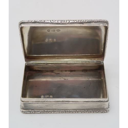 2497 - A WILLIAM IV SILVER SNUFF BOXmaker's mark TS, Birmingham 1838, of rectangular form, with a cast scro... 