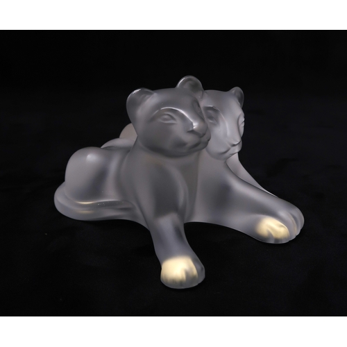 2205 - A LALIQUE CRYSTAL FIGURE OF LION CUBSin frosted clear glass, signed to base Lalique France, 11.5cm l... 