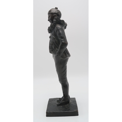 2211 - A BRONZE OF A PIERROTmodelled standing with his hands in his pockets, indistinctly signed, 49cm high... 