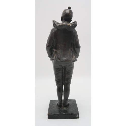 2211 - A BRONZE OF A PIERROTmodelled standing with his hands in his pockets, indistinctly signed, 49cm high... 