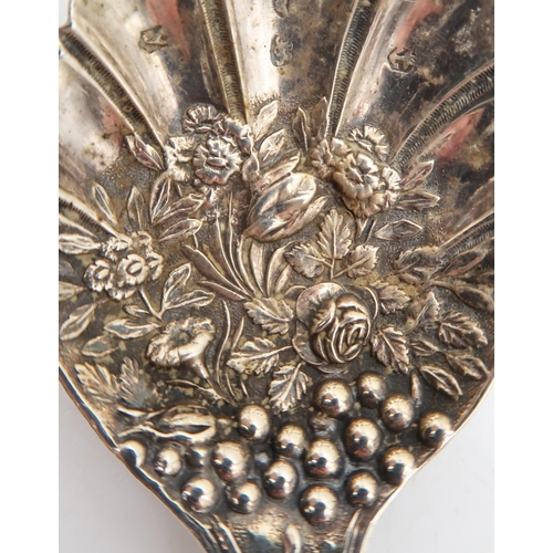 316 - A George IV silver caddy spoon, by Joseph Wilmore, Birmingham 1822, with cast floral decoration, 7.5... 