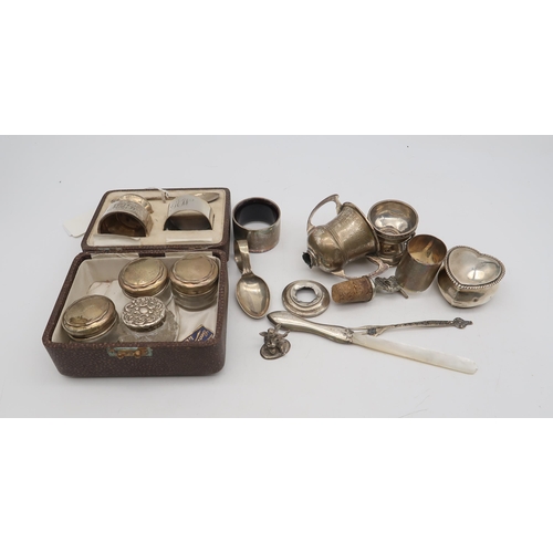 329 - A collection of silver including a three piece christening set, by Samson & Mordan, Birmingham 1... 