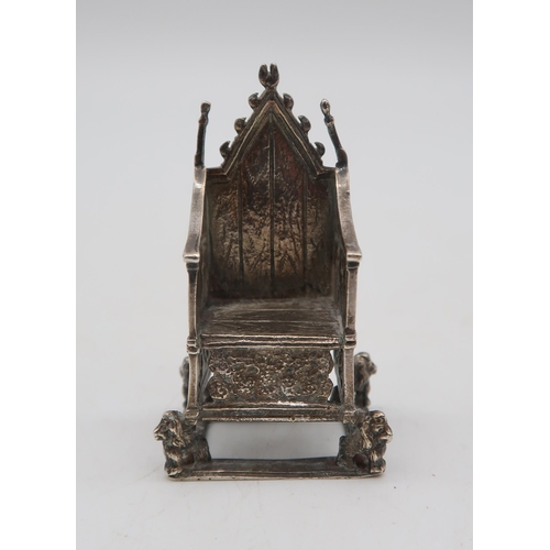 An Edwardian miniature silver coronation throne, by Cornelius Desormeaux Sanders & Francis Hollings, London 1910, 5.5cm high, 24gms