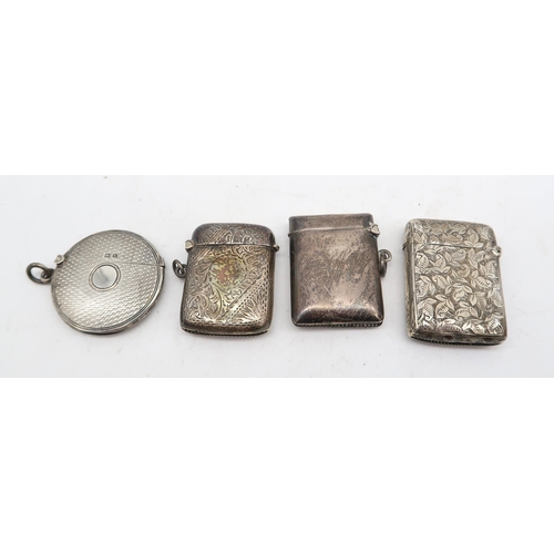 336 - A collection of silver and EPNS vestas, including three rectangular examples, Birmingham marks, one ... 